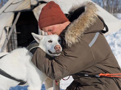 You'll be working closely with your team of huskies | Photo: KST
