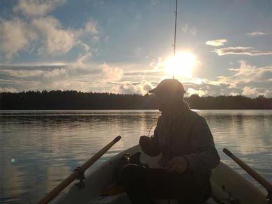 Fishing with the included rowing boat | Photo: TET