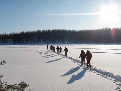 Snowshoeing across a frozen lake | Photo: UT