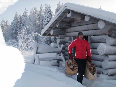 Fetching wood at the cabin | Photo: UT
