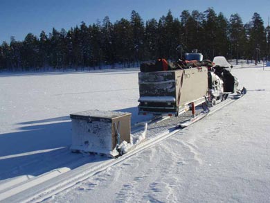 The snowmobile transports luggage and prepares the trails ahead of the group | Photo: UT